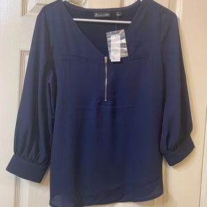 Navy top with silver hardware